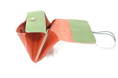 red leather purse money