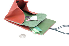 red leather purse money