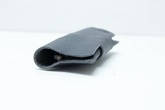 Pochette à lunettes en cuir gris