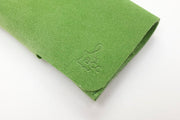 Range lunettes en daim vert