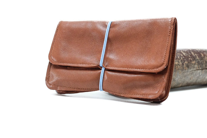 red leather tobacco pouch