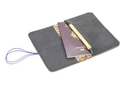 Detail of the anti-sandwich effect fold and the careful finishing of a leather wallet brown dark CreationACC.