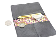 Detail of the anti-sandwich effect fold and the careful finishing of a leather wallet brown dark CreationACC.