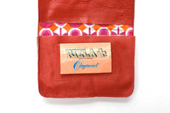 Tobacco pouch red in full grain leather, made in France, engraving offered.