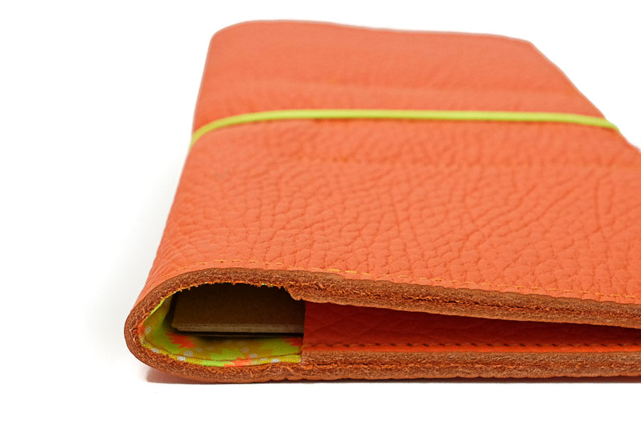 Orange elastic leather checkbook holder