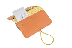 Pamilacan compact and flat wallet in genuine leather orange with matching elastic closure, made in Rennes.