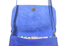 Leather shoulder bag with adjustable strap
