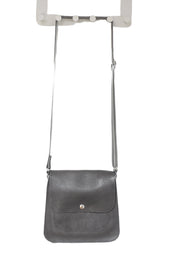 leather handbag with pouches and adjustable sewed leather strap