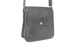 leather handbag with pouches and adjustable sewed leather strap