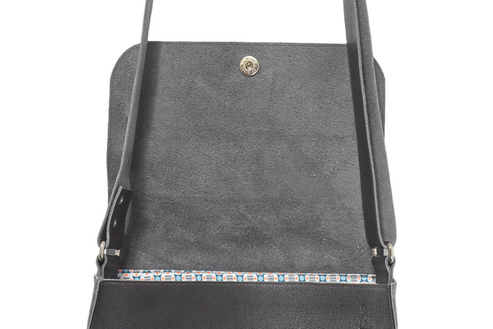 leather handbag with pouches and adjustable sewed leather strap