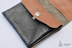 Grand porte-monnaie en cuir noir