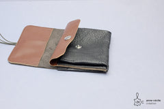 Grand porte-monnaie en cuir noir