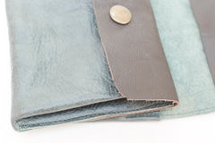 Grand porte-monnaie en cuir vert