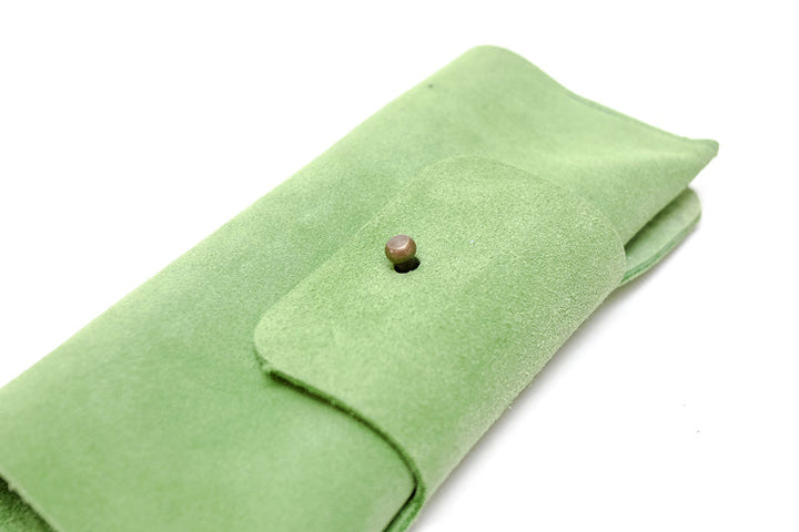 Range lunettes en daim vert