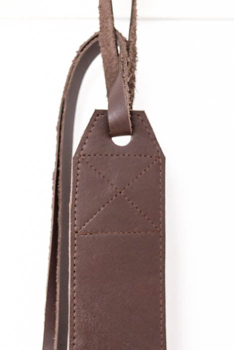 Brown leather guitar strap