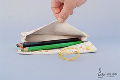 Trousse en cuir tacheté jaune et orange