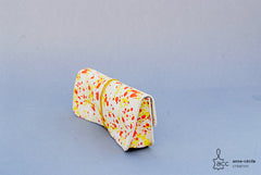 Trousse en cuir tacheté jaune et orange